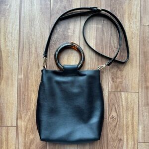 Classic Black Crossbody Bag with Tortoiseshell Ring Handle